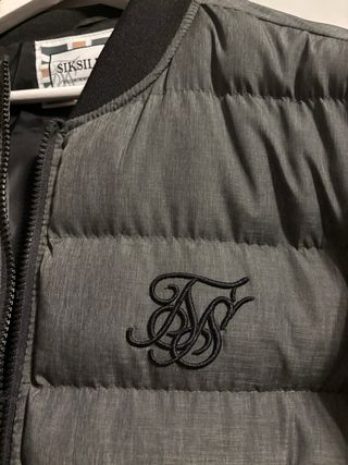 Abrigo SikSilk Talla S, sin usar.