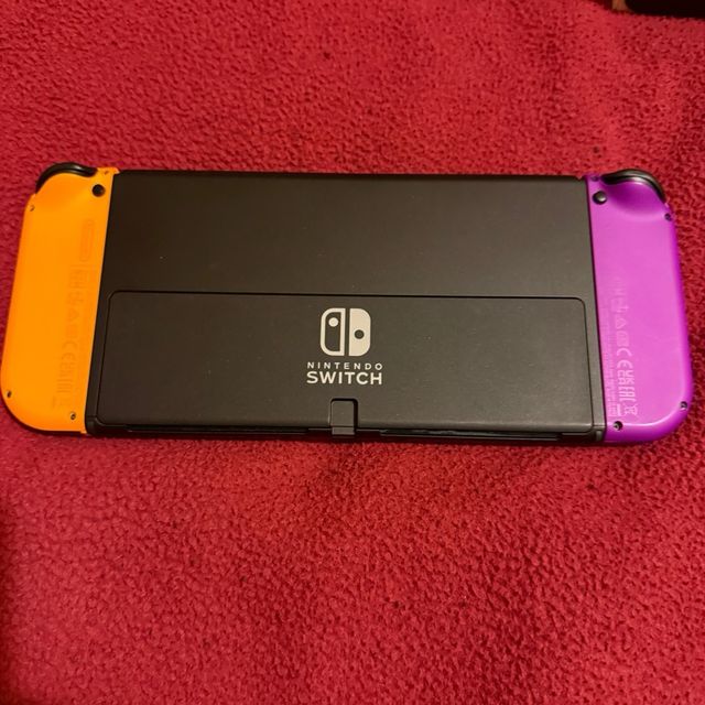 Nintendo Switch OLED Morado/Naranja