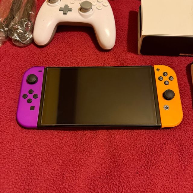 Nintendo Switch OLED Morado/Naranja