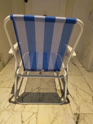 Silla plegable de playa y regalo sombrilla.