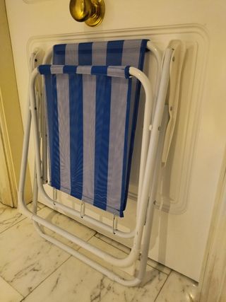Silla plegable de playa y regalo sombrilla.
