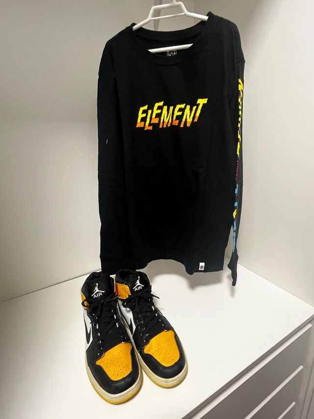 Camiseta Element Negra y Amarilla Talla S. 12 años