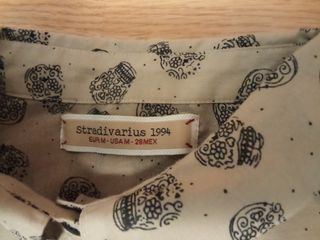 Blusa calaveras mujer beige y negra