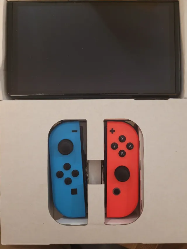 Nintendo Switch OLED Azul y Roja+3 juegos