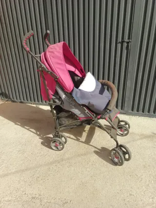 Silla de paseo con funda pies y plástico lluvia