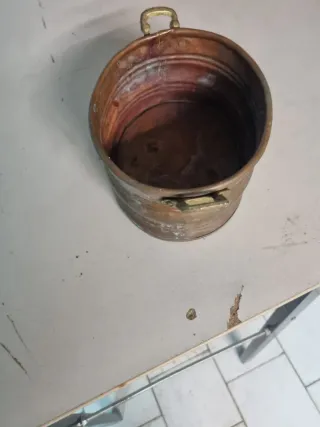 Pentola in rame con manici