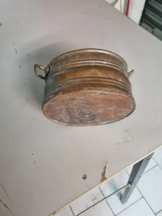 Pentola in rame con manici