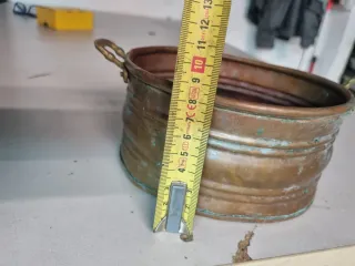 Pentola in rame con manici