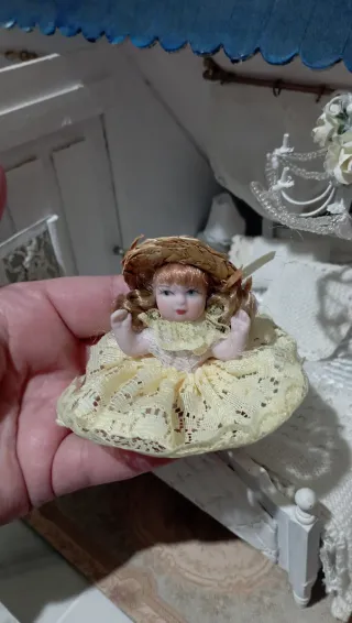 Bambola porcellana casa bambole