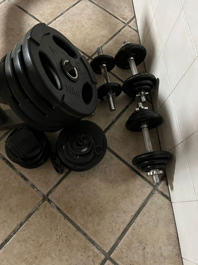 Banco de pesas con barra, mancuernas y Eliptica BH