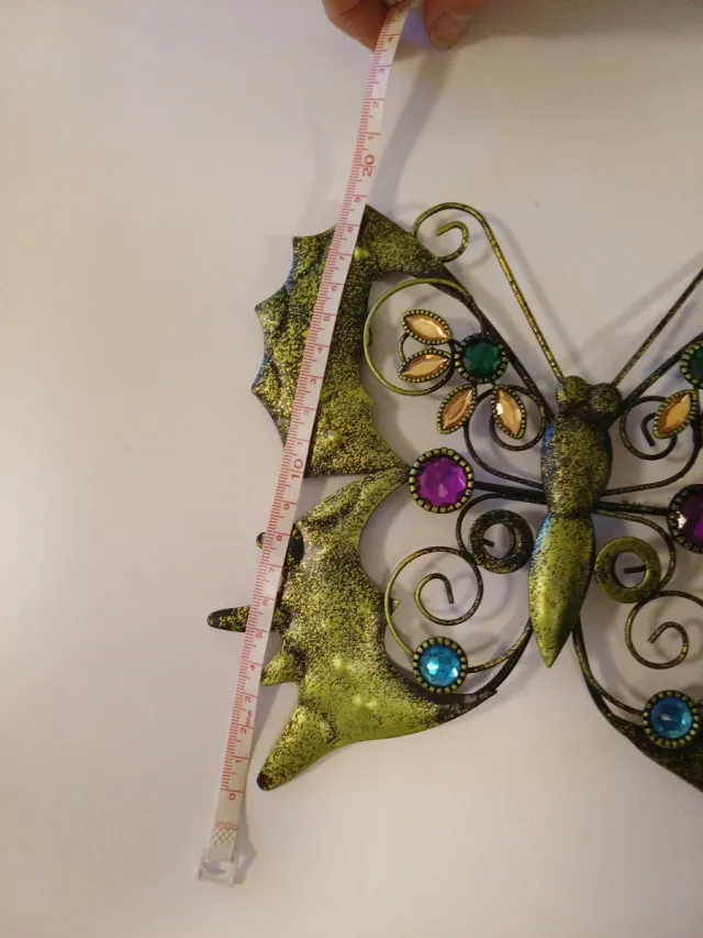 Mariposa metal decorativa con pedrería