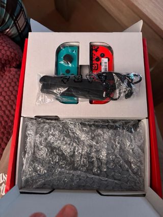 Nintendo Switch OLED Azul/Rojo + Juegos