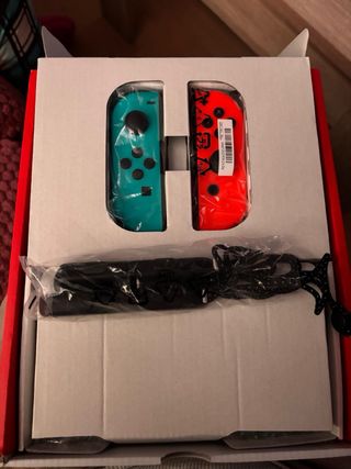 Nintendo Switch OLED Azul/Rojo + Juegos