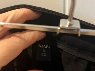 Falda corta plisada negra