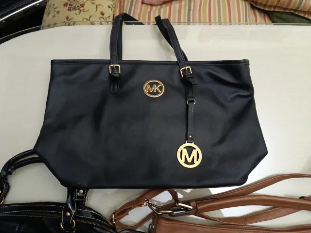 Lote 4 bolsos usados