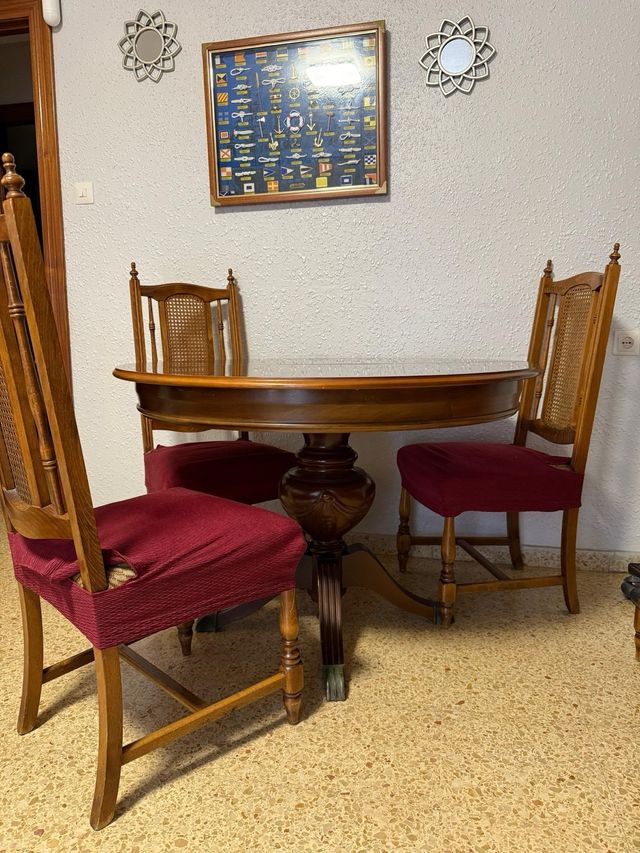 Mesa de comedor redonda con 6 sillas