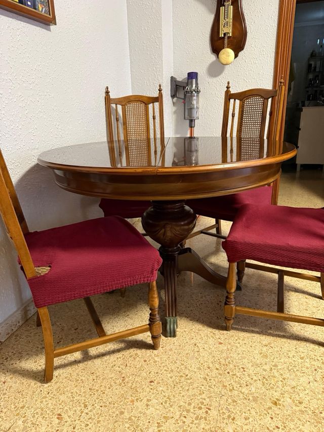 Mesa de comedor redonda con 6 sillas