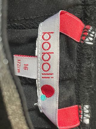 Pantalón terciopelo niña negro con detalles dorado