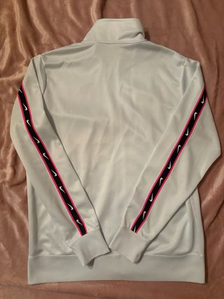 Giacca Nike bianca con dettagli rosa
