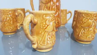 Juego Jarra grande con sus 6 jarras de barro.