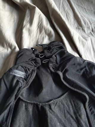 Top sin mangas cuello alto vintage