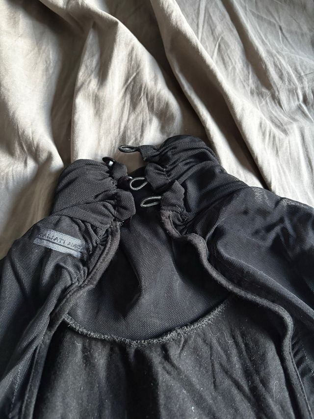 Top sin mangas cuello alto vintage