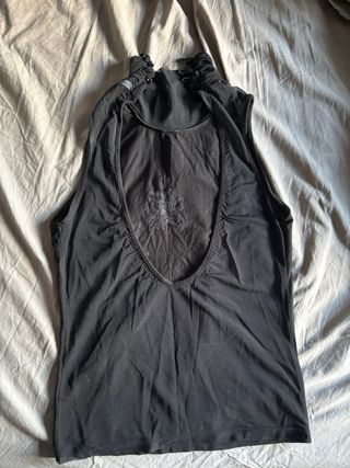 Top sin mangas cuello alto vintage