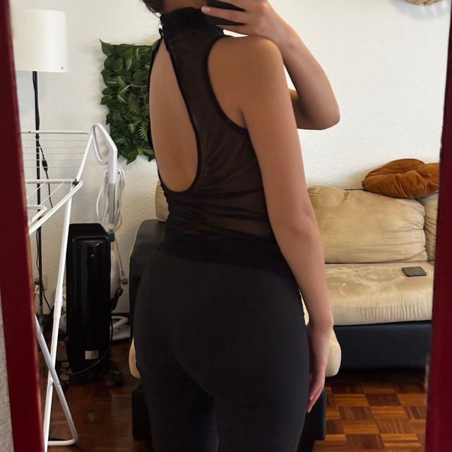 Top sin mangas cuello alto vintage