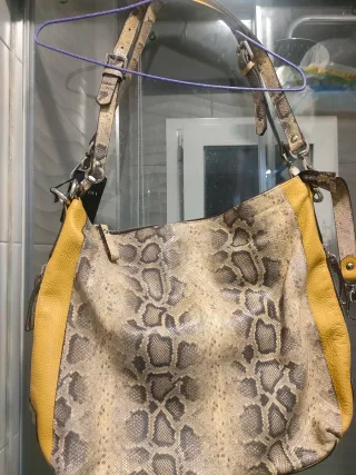 Bolso convertible en mochila estampado piel