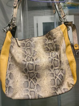 Bolso convertible en mochila estampado piel