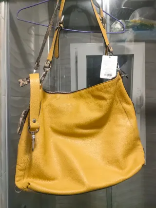 Bolso convertible en mochila estampado piel