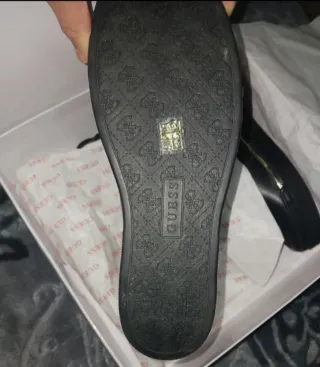 Botines Guess negros y marrones