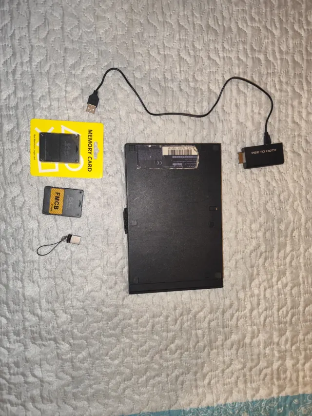 PlayStation 2 con juegos USB y 2 Memory Card