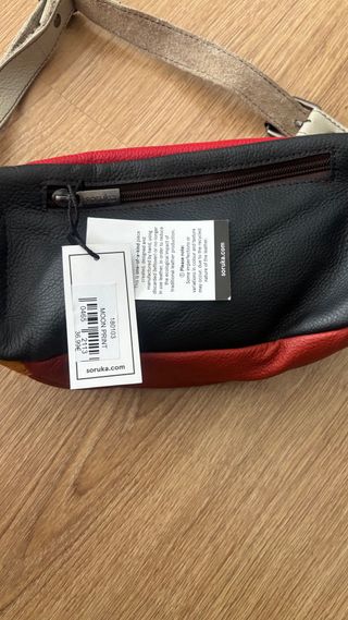 Riñonera  multicolor con estampado animal