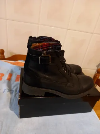 Botas de piel hombre negras