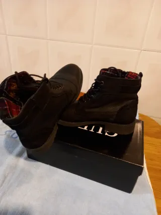 Botas de piel hombre negras