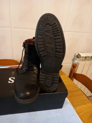 Botas de piel hombre negras