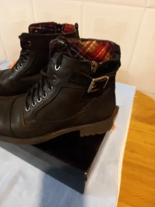 Botas de piel hombre negras