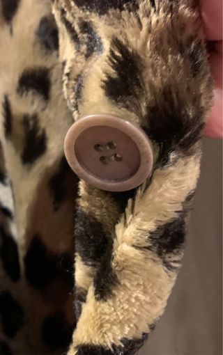 Abrigo reversible estampado leopardo