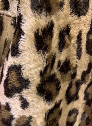 Abrigo reversible estampado leopardo
