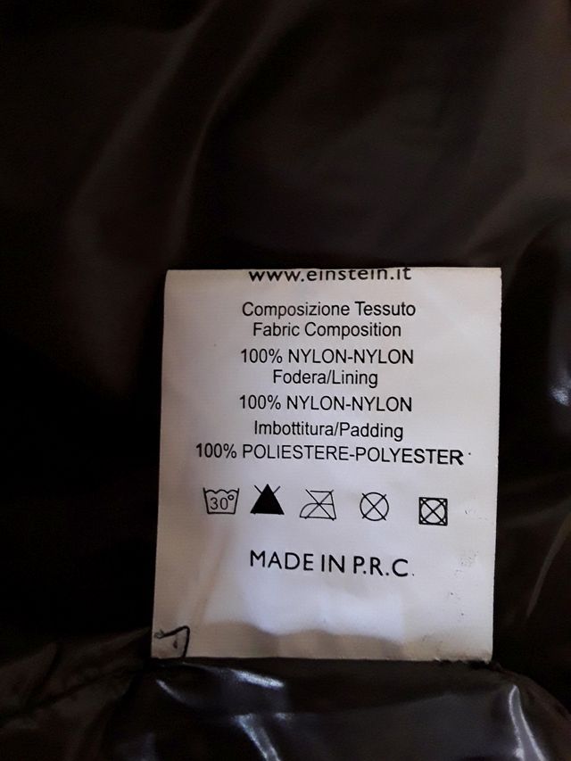 Chaqueta asimétrica de color gris ceniza. Talla S