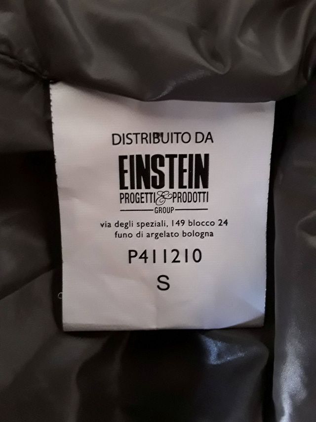 Chaqueta asimétrica de color gris ceniza. Talla S