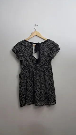 Blusa de flores sin mangas