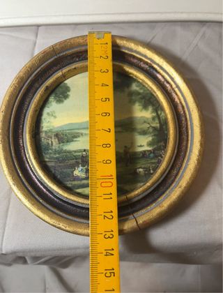 Pareja cuadros redondos vintage dorados