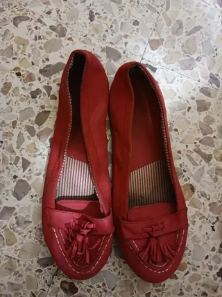 Manoletinas rojas con detalle de flecos