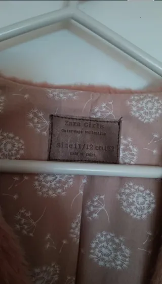 Chaleco pelo niña rosa claro