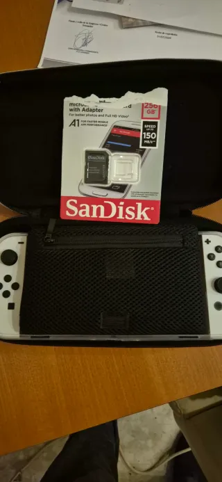 Vendo Nintendo Switch OLED Blanca con magia