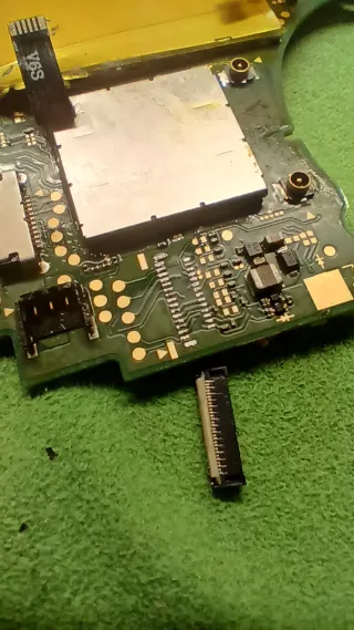 Nintendo Switch Lite Rosa +Funda+ zócalo a reparar