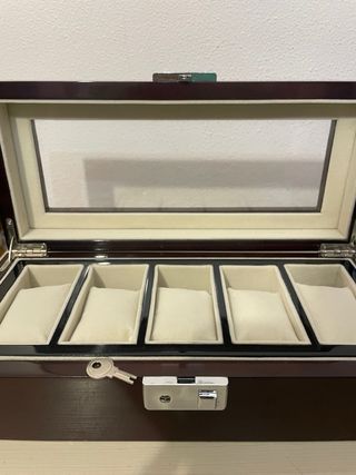 Joyero madera y terciopelo para relojes.