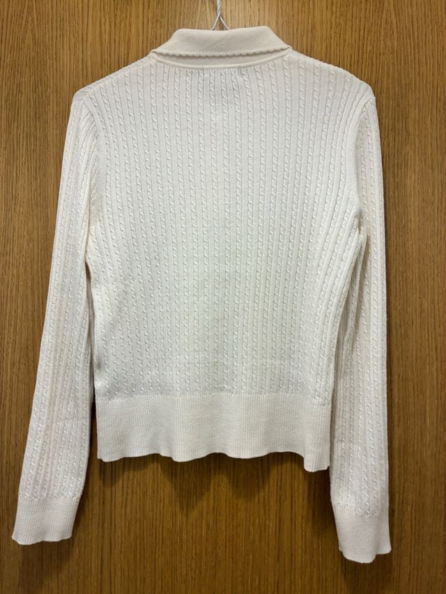 Polo de punto trenzado blanco